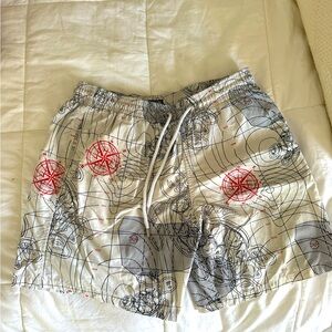 Vilebrequin men’s swimming trunks in a nautical map print.